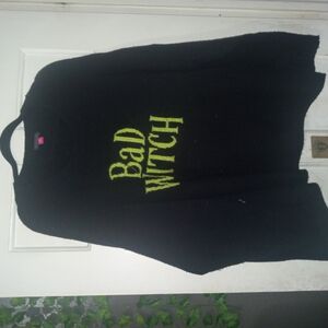 Black Sweater with Yellow 'Bad Witch' Text